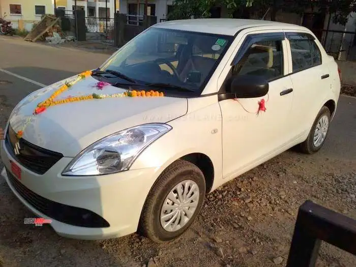 Swift Dzire car used as a comfortable and affordable taxi by Yes Taxi Tours and Travels in Amritsar.