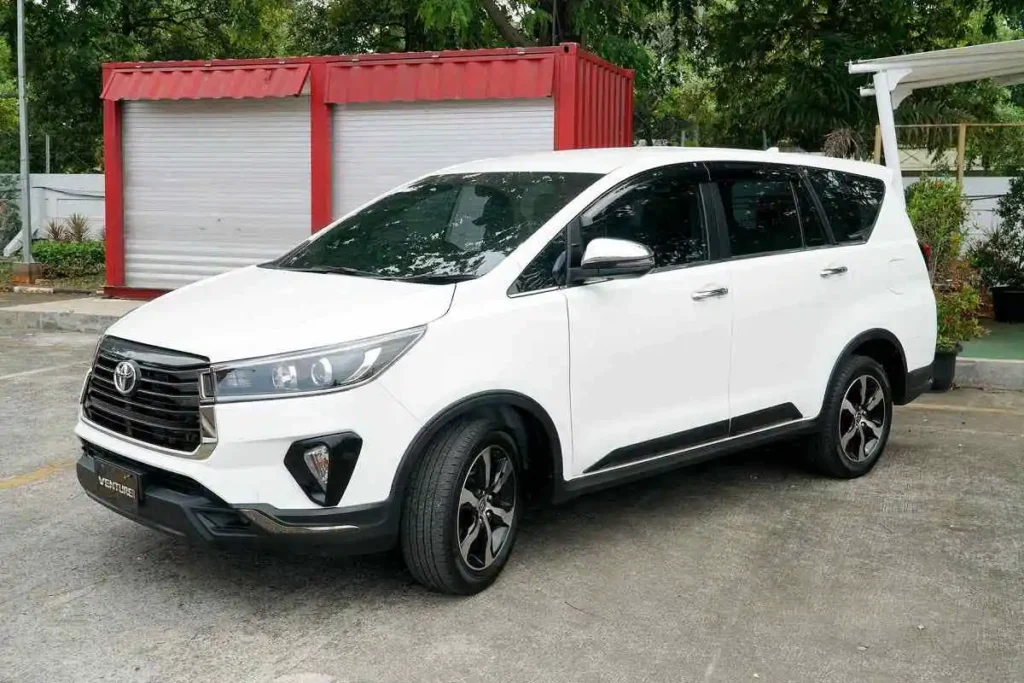 "Toyota Innova Crysta taxi for hire in Amritsar - Spacious and comfortable cab for outstation tours by Yes Taxi Tours and Travels."